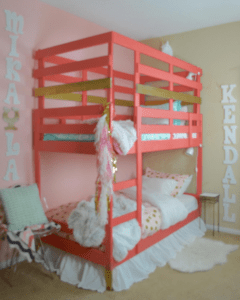 Ikea Bunk Bed Hack with a fort on the top bunk and a traditional mattress on the bottom bunk