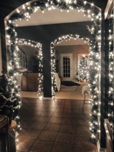 Christmas decoration to the max with lighted garland for Christmas hung on all the archways