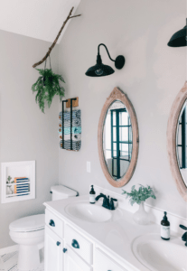 A small bathroom feels luxurious with towel storage