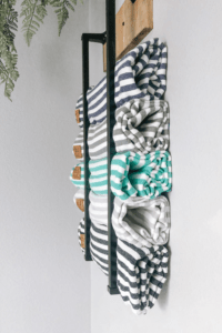 turkish towels in a diy towel holder