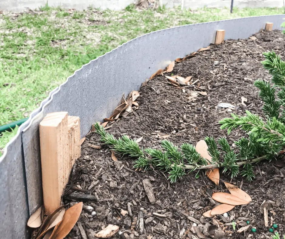 landscape stakes securing metal landscape edging