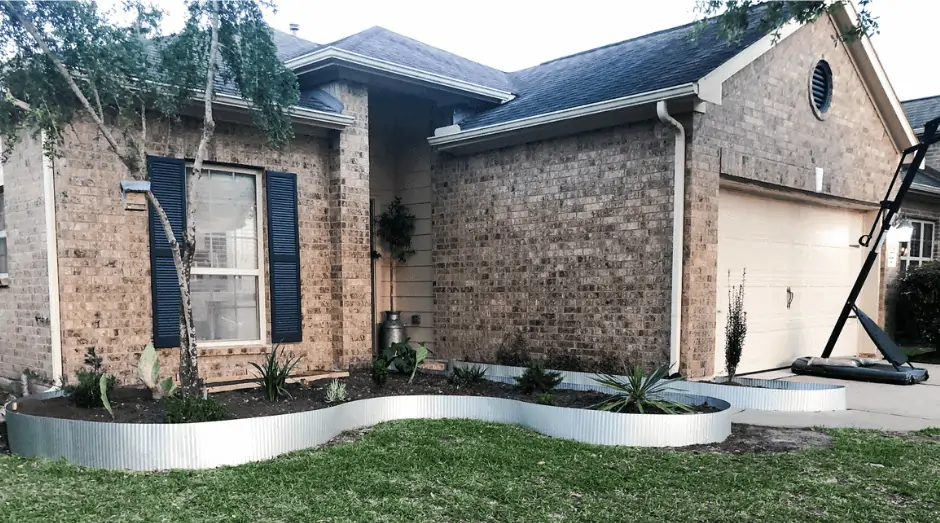 metal landscape border installed in front yard