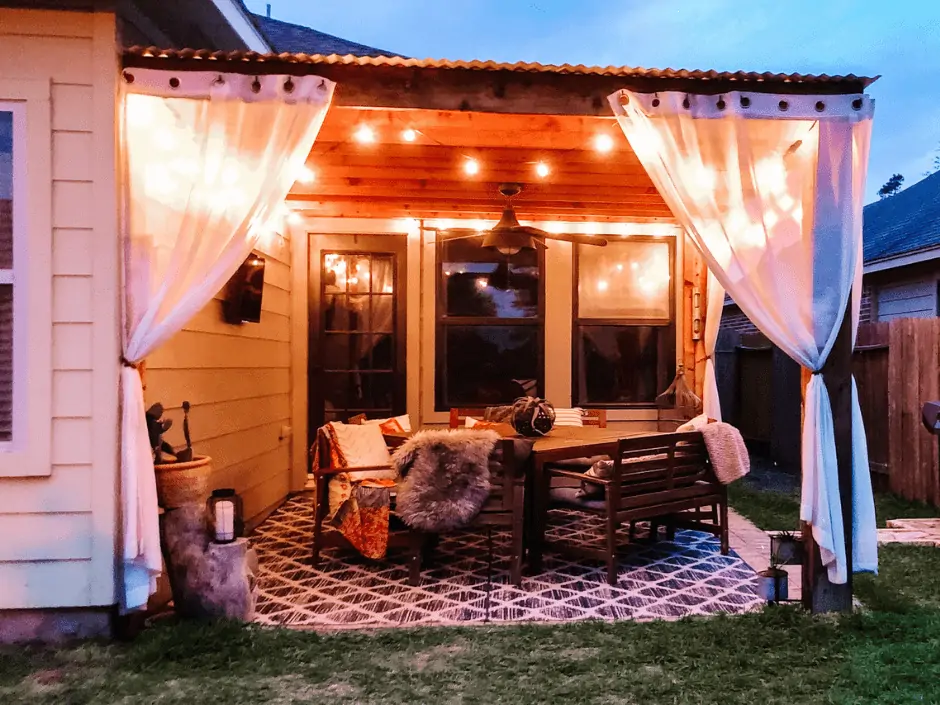 cedar pergola with globe lights