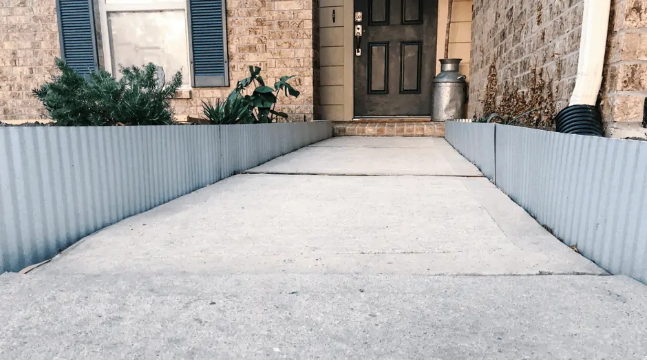 metal landscape border on sides of front walkway