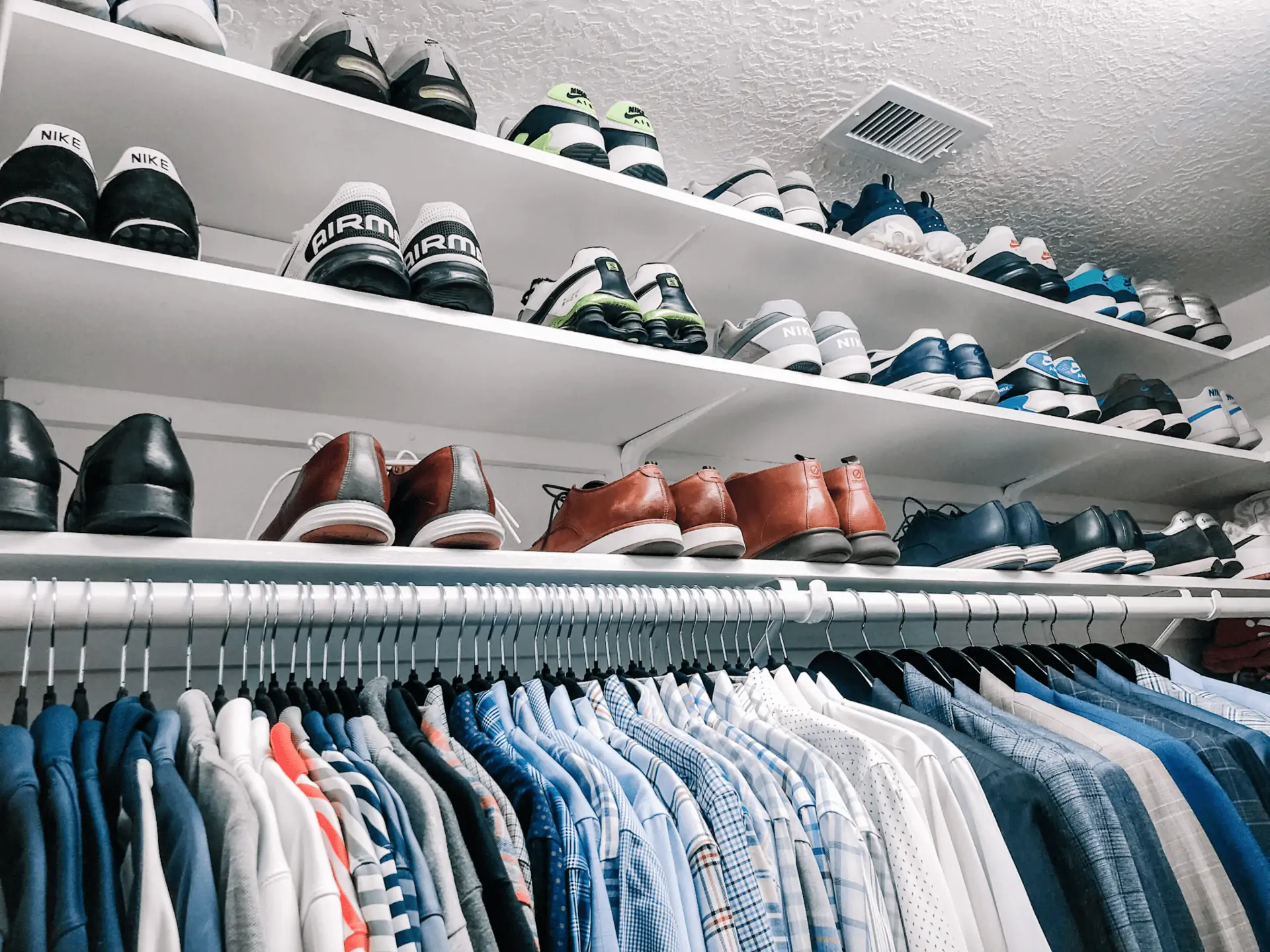 shoe shelves installed into closet all the way around the top