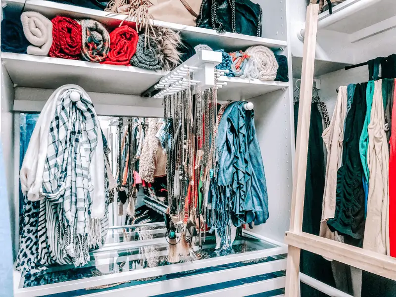 tie butler pulls out to easily see long necklaces organized in closet